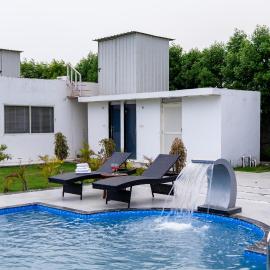 ELIVAAS Signature Malik Farms Countryside Wooden Cottage on 2 Acre Estate with Shared Pool, Garden & Restaurant