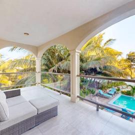 Relaxing condo with shared pool ocean views partial AC & WiFi
