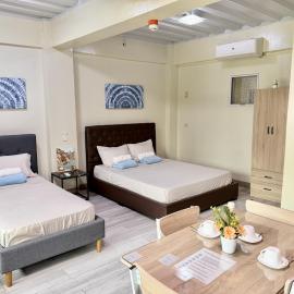 MF Suites, מלון בManolo Fortich
