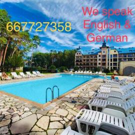 Apartamenty nad morzem z basenem parkingiem przy lesie sosnowy BLUE MARE, hôtel à Łukęcin