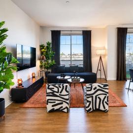 Sun-Drenched Hideaway with Dual Balcony, Pool, & Gym 215