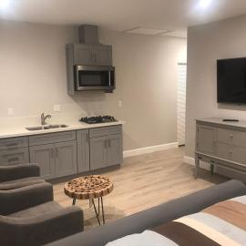 Brand new luxury guest suite with laundry room