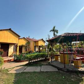 Resort Green Earth, hotel i Tajpur