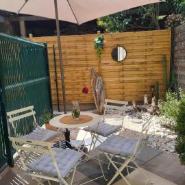 Paisible T2 climatisé avec jardinet, viešbutis mieste Bezjė