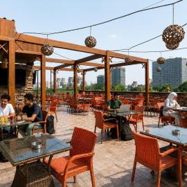 St George Hotel Cairo - 3lGenena Roof Top Bar, Best Coffee Restaurant in Town Over looking The Zoo Garden