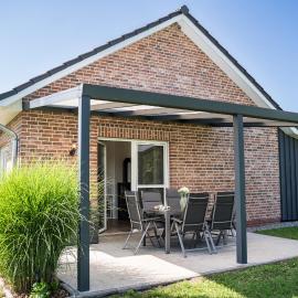 Haus KüstenBrise - Urlaub mit Hund an der Küste mit eigenen Garten, Sauna und gemütlichen Kaminfeuer, hotelli kohteessa Schweiburg