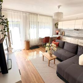 Stilvolles und modernes Souterrain-Apartment im Grünen