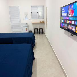 Suítes confortáveis próximo ao Sesc, hotel in Bertioga