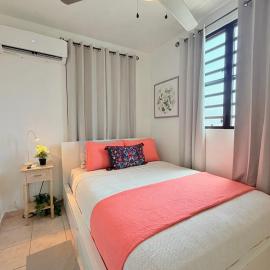Breezy 1 bed apt, short ride from airport and beach