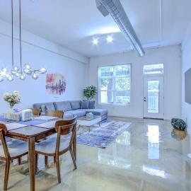 The Stallion #101 - 1BD Modern Loft with Private Patio - Walk to various attractions