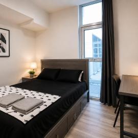Modern 2BR Oasis Sleeps up to 6 with private balcony
