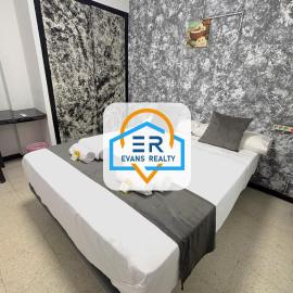 Evans Realty - Hostal Euro Holitel