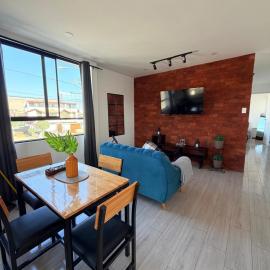 Dpto familiar moderno 2do piso - 2 Hab - 3 camas - wifi - lavadora, хотел в Такна