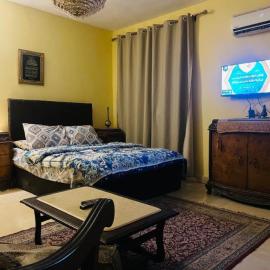 Pyramids Heritage suites, готель у місті Ghaţāţī