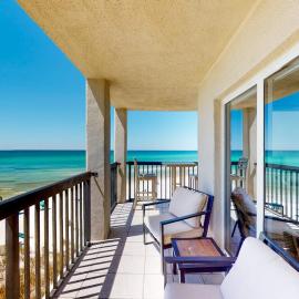 Waterfront condo with a scenic balcony and AC - pool gym and grill access