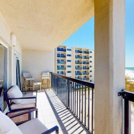 Waterfront condo with a scenic balcony and AC - pool gym and grill access