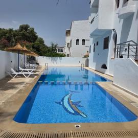 Appartement élégant avec piscine โรงแรมในกาโบเนโกร