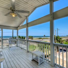 Dog-friendly coastal home with a game room and covered patio