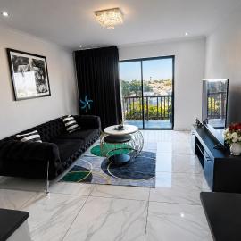 Elegant 1BR Apartment with Balcony