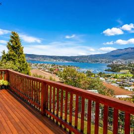 The Lookout with City water and Mountain views