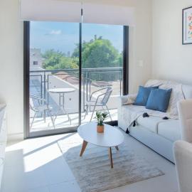 Two-Bedroom Quiet Stay with Rooftop Pool and Coworking