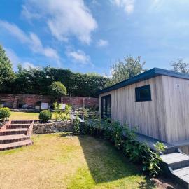 Plas Bach Annexe - Stylish Garden Annexe in the Heart of Prestatyn North Wales Less than 5 mins walk to high street We welcome workers couples solo travellers or small families More info in host details