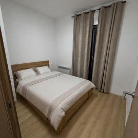 Modern two-bedroom apartment with a parking space