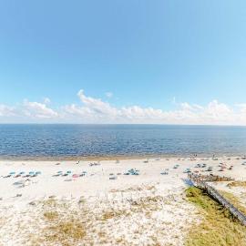 Beachfront condo with Gulf views balcony pool hot tub sauna & gym