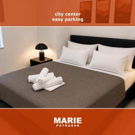 MARIE PATRASSO - Minimal apartment in the center of Patras