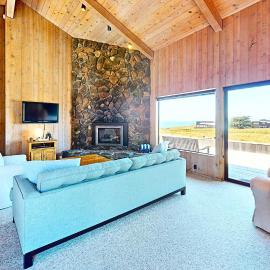 Ocean view home with stone fireplace dog-friendly