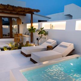 Sea Whisper Suites with private Cycladic patio and heated pool - sea side