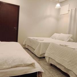 Suíte privativa com cozinha e entrada independente com estacionamento no centro de Sinop