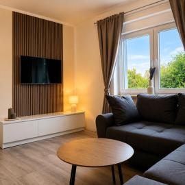 Ferienhaus mit Parkplatz, Sauna, Innenhof und WLAN