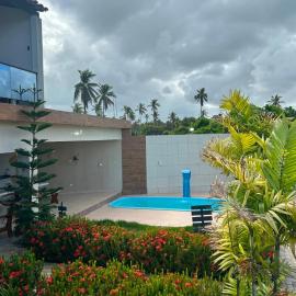 Casa com Piscina dentro do Condominio Mar de São José em Frente ao Restaurante Calamares