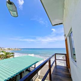 Suite Meridiano Direct Beach Access y AC, מלון בבאייניטה