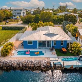 4BR Sombrero Beach House on Canal w Dock & Pool