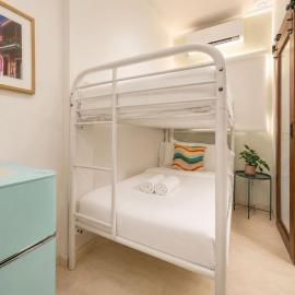 Room 4: Minimalist Bunk Room w/ Free Parking | San Juan