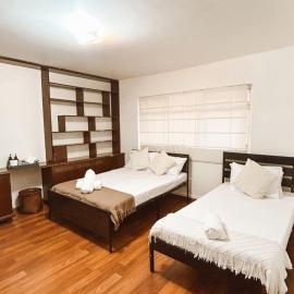 Habitación para 3 personas en Av juarez, hotel a Momoxpan