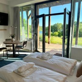 Modernes Studio direkt am See - Strand vor der Tür