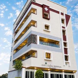 SLS Homestay - Luxury AC Service Apartments 1BHK, 2BHK, 3BHK - Direct Flyover to Alipiri Tirumala Gate - Walk to PS4 Pure Veg Restaurants, Supermarkets - Near to National Highway & Padmavathi Amma Temple - Modular Kitchen, Living room -Free Superfast Wifi