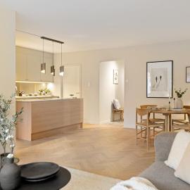 Modern and centrally located apartment with 2 bedrooms and a garage space with EV charger