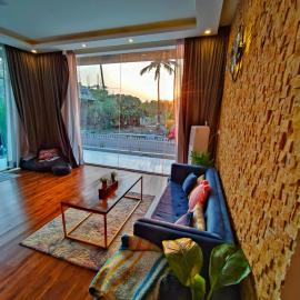 Boho sunset glass house nandi hills، فندق في Nandi