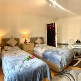 Spacious twin room ground floor street parking