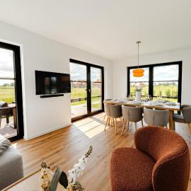 Küsten Suites Hildes Huuske - direkte Wasserlage, Außensauna, Terrasse, 117qm, Neubaugebiet, hotel en Greetsiel