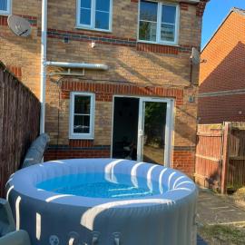 Spacious 2BR Retreat with Private Backyard Jacuzzi