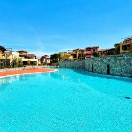 Apartment with 6 pools, tennis, games, and bar