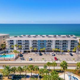 Escape to Beach Oasis! Family Friendly, Updated Beachside Condo with Heated Pool!