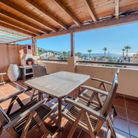 Adosada con vistas al mar y piscina comunitaria