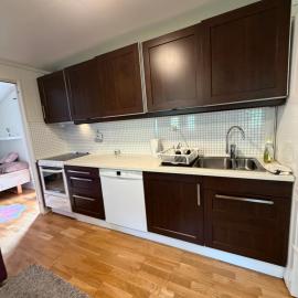 Kristiansand में, होटल Cozy 2-Bedroom Apartment Med Eli bil lading mulighet