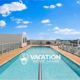 Luxury Condo with Rooftop Pool - 5-Min to Beach